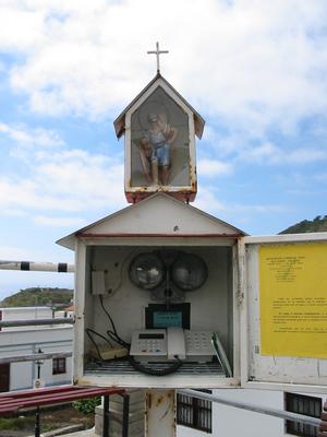 Telephone with saint on top
