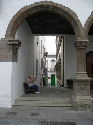 Old man reading a map