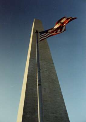 Washington Monument and a flag