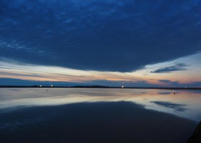 Clouds reflected in marina